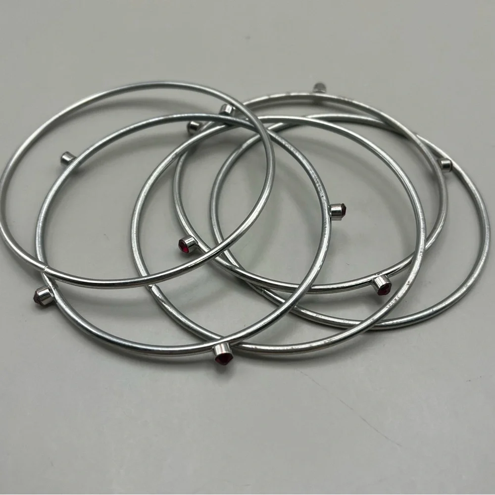 Elegant Silver Bangle Set with Red Accents